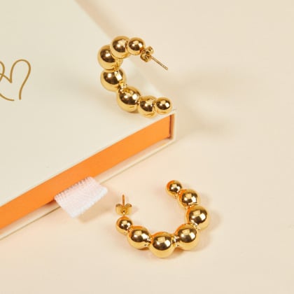 Orecchini a cerchio perlati in acciaio dorato merci maman