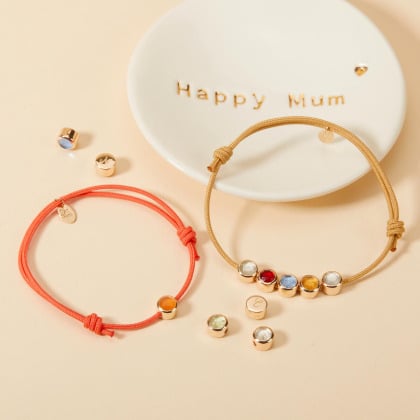Pulsera personalizada con piedra de nacimiento e inicial baño de oro merci maman