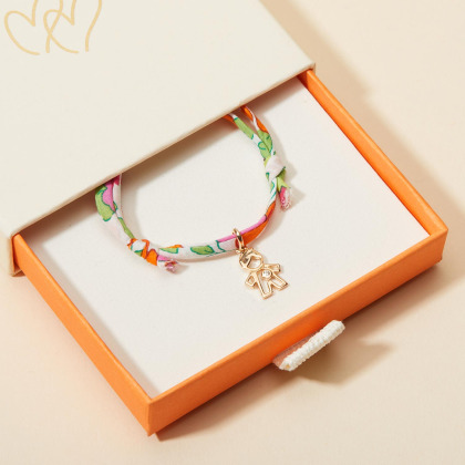 Mini pulsera infantil de cristal Niño Liberty baño de oro merci maman