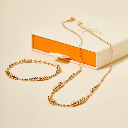 Bracciale con perline dorate placcato in oro merci maman