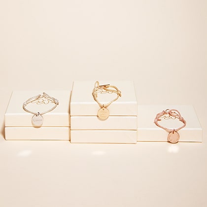 https://www.mercimamanboutique.com/de/personalisiertes-champion-armband