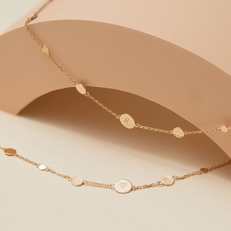A perfect christmas necklaces. The initial pastille necklace which features 7 mini discs to engrave on.